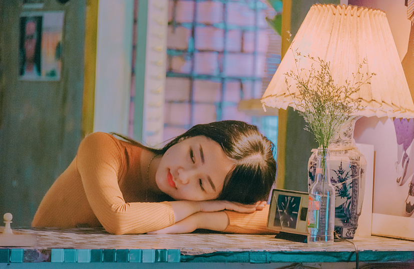 Woman Sleeping on the Table